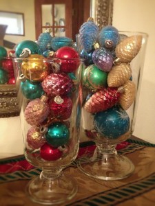 Shiny Brites and other vintage and reproduction ornaments are lovely in glass containers.